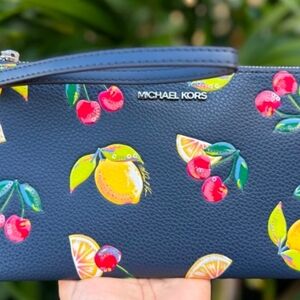 Michael Kors Blue Wristlet with Fruit Design